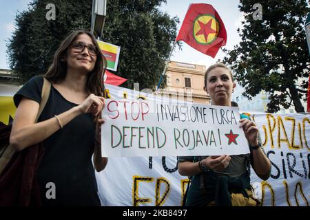 Pro Kurdish activists shout slogans as they stage a protest against Turkish military operations on October 11, 2019 in Rome, Italy. (Photo by Andrea Ronchini/NurPhoto) Stock Photo