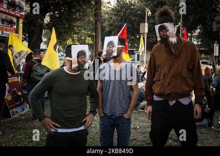 Pro Kurdish activists shout slogans as they stage a protest against Turkish military operations on October 11, 2019 in Rome, Italy. (Photo by Andrea Ronchini/NurPhoto) Stock Photo