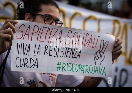 Pro Kurdish activists shout slogans as they stage a protest against Turkish military operations on October 11, 2019 in Rome, Italy. (Photo by Andrea Ronchini/NurPhoto) Stock Photo