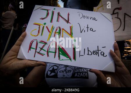 Pro Kurdish activists shout slogans as they stage a protest against Turkish military operations on October 11, 2019 in Rome, Italy. (Photo by Andrea Ronchini/NurPhoto) Stock Photo