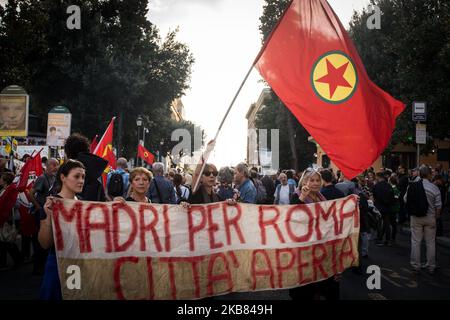 Pro Kurdish activists shout slogans as they stage a protest against Turkish military operations on October 11, 2019 in Rome, Italy. (Photo by Andrea Ronchini/NurPhoto) Stock Photo