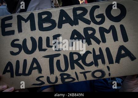 Pro Kurdish activists shout slogans as they stage a protest against Turkish military operations on October 11, 2019 in Rome, Italy. (Photo by Andrea Ronchini/NurPhoto) Stock Photo