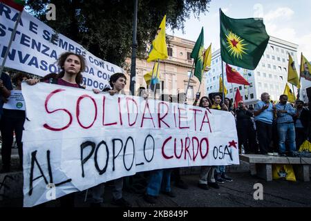 Pro Kurdish activists shout slogans as they stage a protest against Turkish military operations on October 11, 2019 in Rome, Italy. (Photo by Andrea Ronchini/NurPhoto) Stock Photo