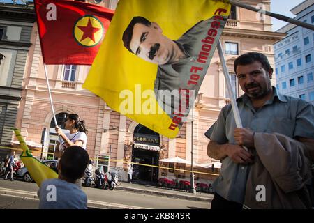 Pro Kurdish activists shout slogans as they stage a protest against Turkish military operations on October 11, 2019 in Rome, Italy. (Photo by Andrea Ronchini/NurPhoto) Stock Photo