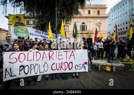 Pro Kurdish activists shout slogans as they stage a protest against Turkish military operations on October 11, 2019 in Rome, Italy. (Photo by Andrea Ronchini/NurPhoto) Stock Photo