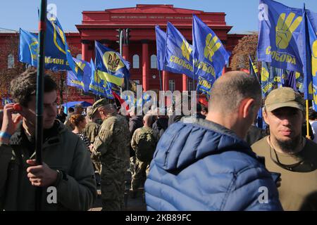 Ukrainians participate a march under the flags of far-right Svoboda ...