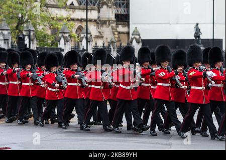 British soldiers of the Scots Guards march outside the Houses of Parliament during the State Opening of Parliament on 14 October, 2019 in London, England. (Photo by WIktor Szymanowicz/NurPhoto) Stock Photo