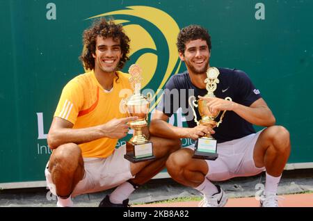 Tunisians Aziz Dougaz and Skander Monsouri pose with trophy after winners of the Men's Double final against Zimbabwe brothers, Benjamin Lock and Courtney Lock on 14th October 2019 in Lagos, Nigeria. (Photo by Olukayode Jaiyeola/NurPhoto) Stock Photo