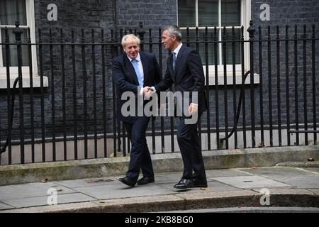 UK Prime Minister Boris Johnson welcomes NATO Secretary General Jens Stoltenberg to 10 Downing Street on October 15, 2019 in London, England. (Photo by Alberto Pezzali/NurPhoto) Stock Photo