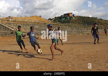 Rohingya children are playing football at Kutupalong refugee camp in Cox's Bazar Bangladesh on October 17, 2019. (Photo by Kazi Salahuddin Razu/NurPhoto) Stock Photo