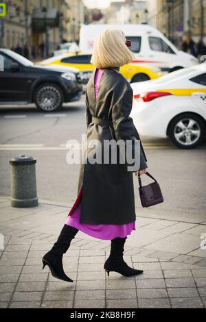 People take part in the Street Style Mercedes Benz-Fashion Week Russia Spring/Summer 2020 - Day 3, on October 17, 2019 in Moscow, Russia. (Photo by Nataliya Petrova/NurPhoto) Stock Photo