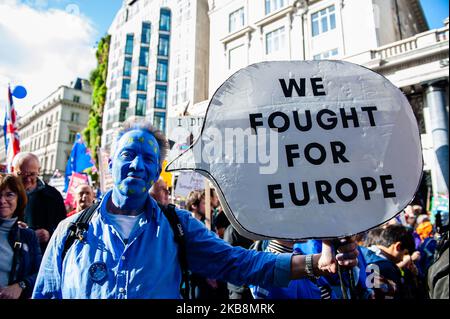 Anti-Brexit protesters take part in 'Together for the Final Say' rally on October 19th, 2019, in London, UK. A few days before the Brexit becomes a reality, one of the biggest public protests in British history took place in London. More than a million people participated in mass outside parliament to deliver a message loud and clear to the Government and MPs that they should trust the people, not Boris Johnson, to solve the Brexit crisis. At the Parliament Square, speeches were given from leading cross-party politicians and celebrity voices who support a People's Vote. (Photo by Romy Arroyo F Stock Photo