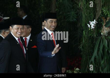 Indonesian President, Joko Widodo (R) walking to the main hall before the Presidential Inauguration Ceremony at the House of Representative building, Jakarta on October 20, 2019. Joko Widodo has been re-elected as Indonesian President for period for 2019-2024 with Ma'ruf Amin as Vice President. (Photo by Aditya Irawan/NurPhoto) Stock Photo