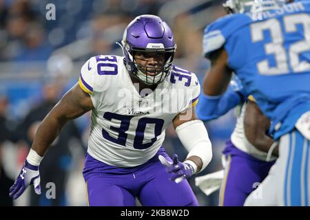 Minnesota Vikings fullback C.J. Ham (30) celebrates after his touchdown  with offensive tackle Brian O'Neill, right, in the second half of an NFL  football game against the Buffalo Bills, Sunday, Nov. 13