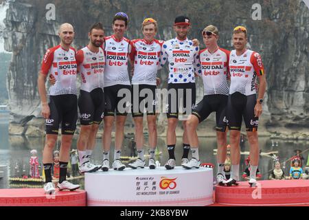 Tomasz Marczynski of Poland and his team-mates from Lotto-Soudal, seen at the Awards Ceremony as they wins the Team General Classment of the 3rd edition of the Cycling Tour de Guangxi 2019. On Tuesday, October 22, 2019, in Guilin, Guangxi Region, China. (Photo by Artur Widak/NurPhoto) Stock Photo