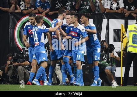 Napoli defender Giovanni Di Lorenzo (22) celebrates with his teammates after scoring his goal to make it 3-3 during the Serie A football match n.2 JUVENTUS - NAPOLI on August 31, 2019 at the Allianz Stadium in Turin, Piedmont, Italy. Final result: Juventus-Napoli 4-3. (Photo by Matteo Bottanelli/NurPhoto) Stock Photo