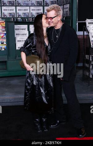 HOLLYWOOD, LOS ANGELES, CALIFORNIA, USA - OCTOBER 24: China Chow and Billy Idol arrive at the Premiere Of Netflix's 'The Irishman' held at TCL Chinese Theatre IMAX on October 24, 2019 in Hollywood, Los Angeles, California, United States. (Photo by David Acosta/Image Press Agency/NurPhoto) Stock Photo