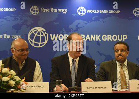 (L-R) World Bank country Director for India Junaid Ahmad, World Bank President David Malpass, Regional Director for South Asia of International Finance Corporation (IFC) Mengistu Alemaheyu during a press conference in New Delhi on October 26, 2019. (Photo by Indraneel Chowdhury/NurPhoto) Stock Photo