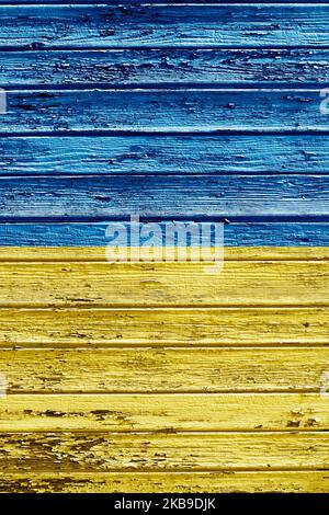 flag of Ukraine painted on wooden frame Stock Photo