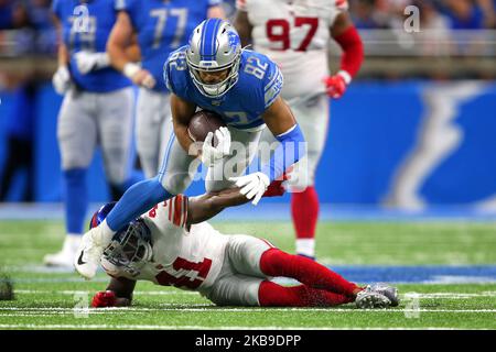 Detroit Lions tight end Logan Thomas (82) goes down over New York Giants free safety Antoine Bethea (41) during the first half of an NFL football game against the New York Giants in Detroit, Michigan USA, on Sunday, October 27, 2019. (Photo by Amy Lemus/NurPhoto) Stock Photo