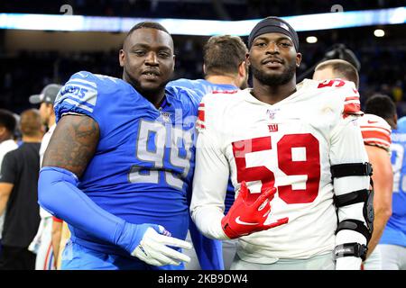 New York Giants defensive tackle Barry Cofield holds up a newspaper  proclaiming the Giants' win over the New England Patriots at Super Bowl  XLII at University of Phoenix Stadium in Glendale, Arizona