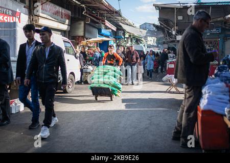 On Oct. 27, 2019, a young man pushes a cart of flour sacks as citizens of the Turkish capital city, Ankara, went shopping in bazaars and markets, buying food and consumer goods, as the Turkish economy steadies following a military operation in Syria and before the possible imposition of US sanctions. (Photo by Diego Cupolo/NurPhoto) Stock Photo