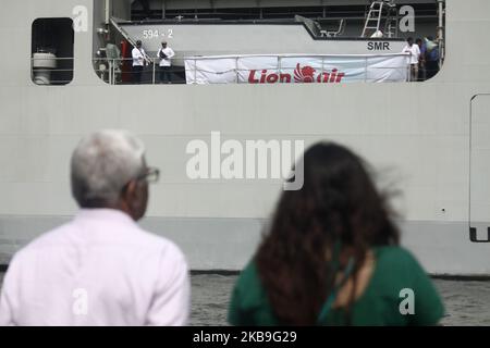 Father of Bhavye Suneja (left), pilot of B737 Max 8 Lion Air which was crash in Java Sea, attend at Tanjung Priok harbour, Jakarta, after other families of victims doing flowers and prayers at the crash site on Tuesday, October 29, 2019. The event was conduct by Lion Air management to marks one year of the disaster. (Photo by Aditya Irawan/NurPhoto) Stock Photo