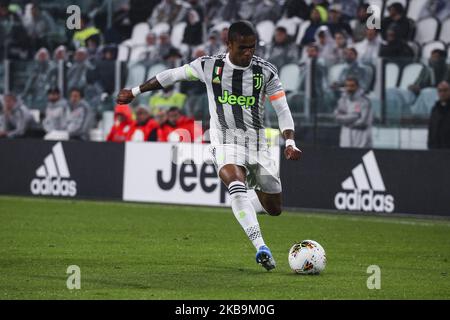 Juventus forward Douglas Costa (11) in action during the Serie A football match n.10 JUVENTUS - GENOA on October 30, 2019 at the Allianz Stadium in Turin, Piedmont, Italy. Final result: Juventus-Genoa 2-1. (Photo by Matteo Bottanelli/NurPhoto) Stock Photo