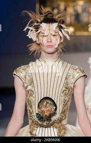 A model walks the runway during the Guo Pei Haute Couture Spring/Summer ...