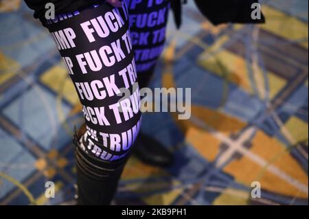 An attendee wear leggings protesting the Trump administration as Speaker Nancy Pelosi keynotes the Inaugural Independence Dinner, hosted by Pennsylvania Democratic Party, at the Pennsylvania Convention Center, in Philadelphia, PA, on November 1, 2019. (Photo by Bastiaan Slabbers/NurPhoto) Stock Photo