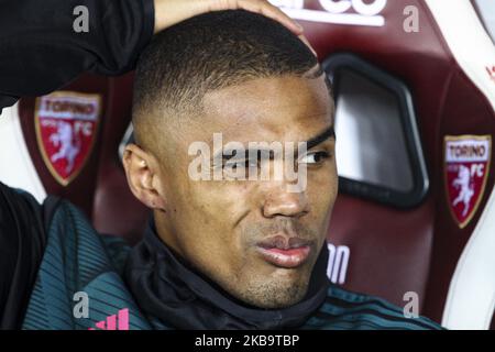 Juventus forward Douglas Costa (11) waits on the bench during the Serie A football match n.11 TORINO - JUVENTUS on November 02, 2019 at the Stadio Olimpico Grande Torino in Turin, Piedmont, Italy. Final result: Torino-Juventus 0-1. (Photo by Matteo Bottanelli/NurPhoto) Stock Photo