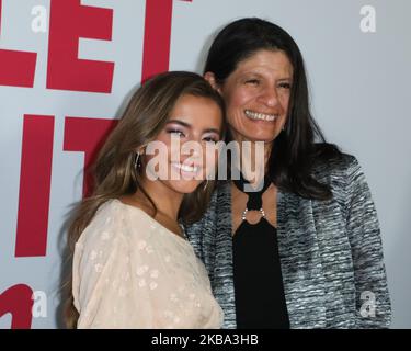 LOS ANGELES, CALIFORNIA, USA - NOVEMBER 04: Actress Isabela Merced (Isabela Moner) and mother Katherine Moner arrive at the Los Angeles Premiere Of Netflix's 'Let It Snow' held at Pacific Theatres at The Grove on November 4, 2019 in Los Angeles, California, United States. (Photo by Image Press Agency/NurPhoto) Stock Photo