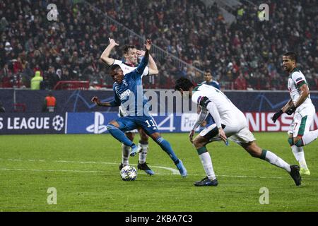 Juventus forward Douglas Costa (11) scores his goal to make it 1-2 during the Uefa Champions League group stage football match n.4 LOKOMOTIV MOSKVA - JUVENTUS on November 06, 2019 at the RZD Arena in Moscow, Central Area, Russia. (Photo by Matteo Bottanelli/NurPhoto) Stock Photo