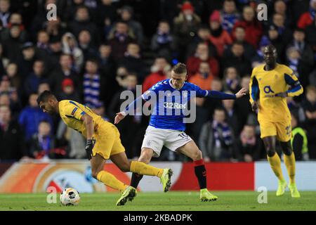 Steven Davis of Glasgow Rangers in action with FC Porto's Jesus Manuel Corona during the UEFA Europa League Group G match between Glasgow Rangers and FC Porto at Ibrox Park, Glasgow on Thursday 7th November 2019. (Photo by Mark Fletcher/MI News/NurPhoto) Stock Photo