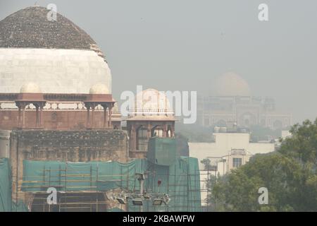 A view of Humayun's Tomb (background) with Khan-I-Khana Tomb (foreground) as smog engulfs the capital worsening the air pollution to 'Severe' category in New Delhi, India on 14 November 2019. (Photo by Indraneel Chowdhury/NurPhoto) Stock Photo