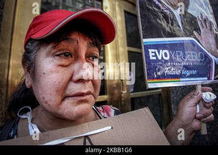 Bolivian residents in Argentina, social organizations and leftist activists protest in front of the Bolivian embassy in Buenos Aires against the coup in Bolivia, on November 15, 2019. (Photo by Carol Smiljan/NurPhoto) Stock Photo