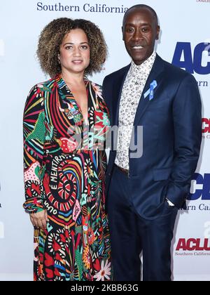 BEVERLY HILLS, LOS ANGELES, CALIFORNIA, USA - NOVEMBER 17: Bridgid Coulter and actor Don Cheadle arrive at the ACLU SoCal's Annual Bill Of Rights Dinner 2019 held at the Beverly Wilshire Four Seasons Hotel on November 17, 2019 in Beverly Hills, Los Angeles, California, United States. (Photo by Xavier Collin/Image Press Agency/NurPhoto) Stock Photo