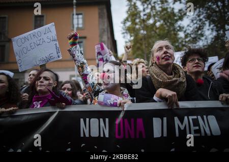 Women take part in a national march organised by 'Non Una Di Meno' (Not One Less) movement in Rome, on November 23, 2019. Thousands of people took to the streets to denounce male violence against women, gender discrimination, and harassment in the workplaces. (Photo by Christian Minelli/NurPhoto) Stock Photo