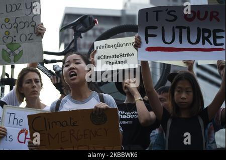 Environmental activists participate during the Global Climate Strike event in Bangkok, Thailand, 29 November 2019. The movement is a continuation of the Global Climate Strike led by Greta Thunberg and to call on world leaders who will attend the United Nations climate change conference. (Photo by Anusak Laowilas/NurPhoto) Stock Photo