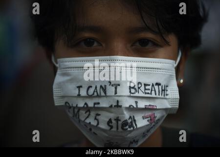 Environmental activists participate during the Global Climate Strike event in Bangkok, Thailand, 29 November 2019. The movement is a continuation of the Global Climate Strike led by Greta Thunberg and to call on world leaders who will attend the United Nations climate change conference. (Photo by Anusak Laowilas/NurPhoto) Stock Photo