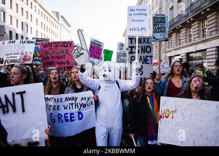 Activists march up Regent Street St James's during the latest 'climate strike' demonstration in London, England, on November 29, 2019. Today's climate strike comes near the end of a year in which climate activism has taken centre stage in cities around the world, spearheaded both by the Greta Thunberg-inspired 'Fridays For Future' striker movement and by the activists of the equally-global Extinction Rebellion. Next week sees the two-week COP25 UN Climate Change Conference begin in Madrid. (Photo by David Cliff/NurPhoto)