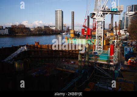 Work continues on the Thames Tideway Tunnel, colloquially known as the 'Super Sewer', in a walled-off area of the River Thames beside Vauxhall Bridge in London, England, on November 30, 2019. The 25km tunnel, begun in 2016 and due for completion in 2024, will form a major upgrade to London's 150-year-old sewer system, which at present allows huge amounts of raw sewage to spill into the Thames each year. (Photo by David Cliff/NurPhoto) Stock Photo