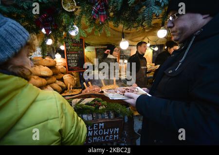 A stand with a traditional Polish Food for sale at Christmas Market, Krakow's Market Square. On SUnday, December 1, 2019, in Krakow, Lesser Poland Voivodeship, Poland. (Photo by Artur Widak/NurPhoto) Stock Photo