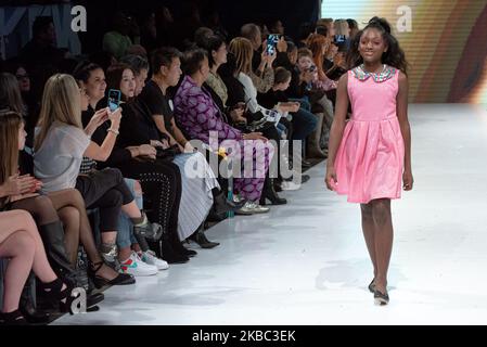 A model walks the runway at the Young Socialites collection for Spring and Summer 2020 during the third annual Toronto Kids Fashion Week fashion show on November 30, 2019 in Toronto, Canada (Photo by Anatoliy Cherkasov/NurPhoto) Stock Photo