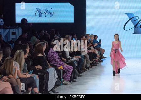 A model walks the runway at the Young Socialites collection for Spring and Summer 2020 during the third annual Toronto Kids Fashion Week fashion show on November 30, 2019 in Toronto, Canada (Photo by Anatoliy Cherkasov/NurPhoto) Stock Photo