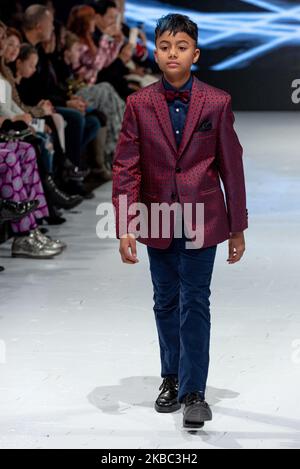 A model walks the runway at the Crawford Boys collection for Spring and Summer 2020 during