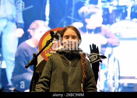 Climate change activist Greta Thunberg speaks onstage during a mass climate march in Madrid for COP25 on December 6th, 2019. (Photo by Juan Carlos Lucas/NurPhoto) Stock Photo