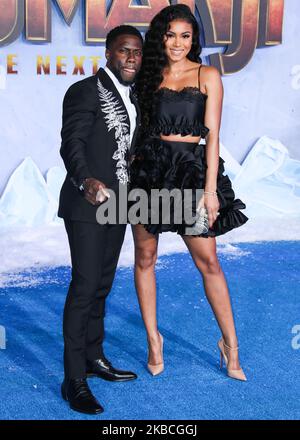 HOLLYWOOD, LOS ANGELES, CALIFORNIA, USA - DECEMBER 09: Actor Kevin Hart and wife Eniko Parrish arrive at the World Premiere Of Columbia Pictures' 'Jumanji: The Next Level' held at the TCL Chinese Theatre IMAX on December 9, 2019 in Hollywood, Los Angeles, California, United States. (Photo by Xavier Collin/Image Press Agency/NurPhoto) Stock Photo