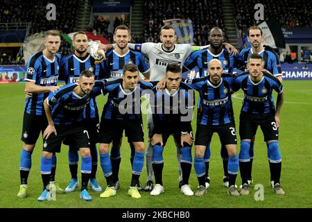 Players of FC Internazionale line up prior the UEFA Champions League group F match between FC Internazionale and FC Barcelona at Stadio Giuseppe Meazza on December 10, 2019 in Milan, Italy. (Photo by Giuseppe Cottini/NurPhoto) Stock Photo