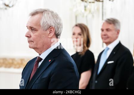 President Sauli Niinistö addresses resigned prime minister Antti Rinne as the resigned government of Finland pays a complimentary visit to the President of Finland at the Presidential Palace in Helsinki, Finland, on December 10, 2019. The leader of Centre Party Katri Kulmuni whose party forced the prime minister to resign is on the background. (Photo by Antti Yrjonen/NurPhoto) Stock Photo